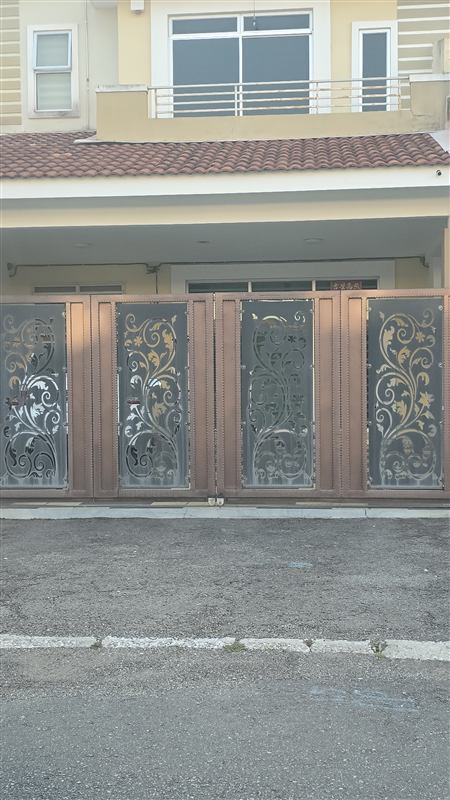 Gate with laser-cut floral panels in bronze finish