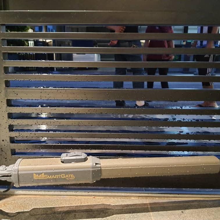 SmartGate swing gate motor installed